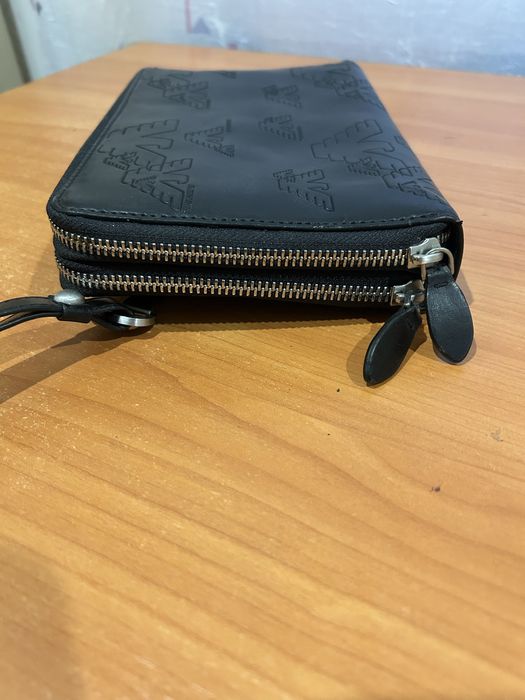 Шкіряна чоловіча барсетка EMPORIO ARMANI (Італія). Колір черний