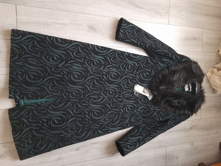 Пальто для жінок