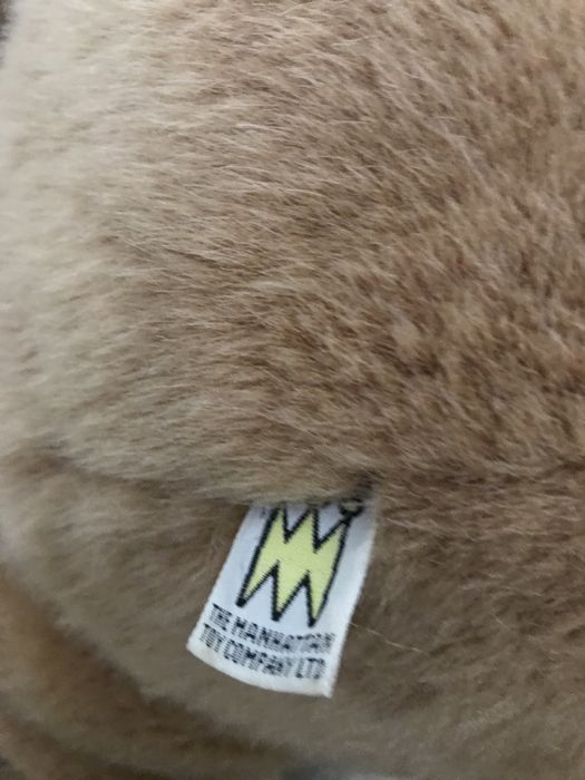 Огромный мишка