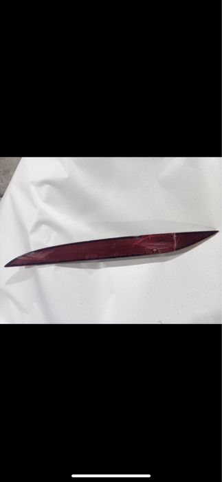 Катафот левый заднего бампера тесла х