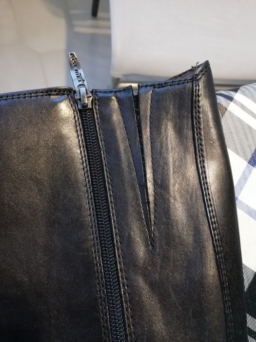 Botas em pele cano alto