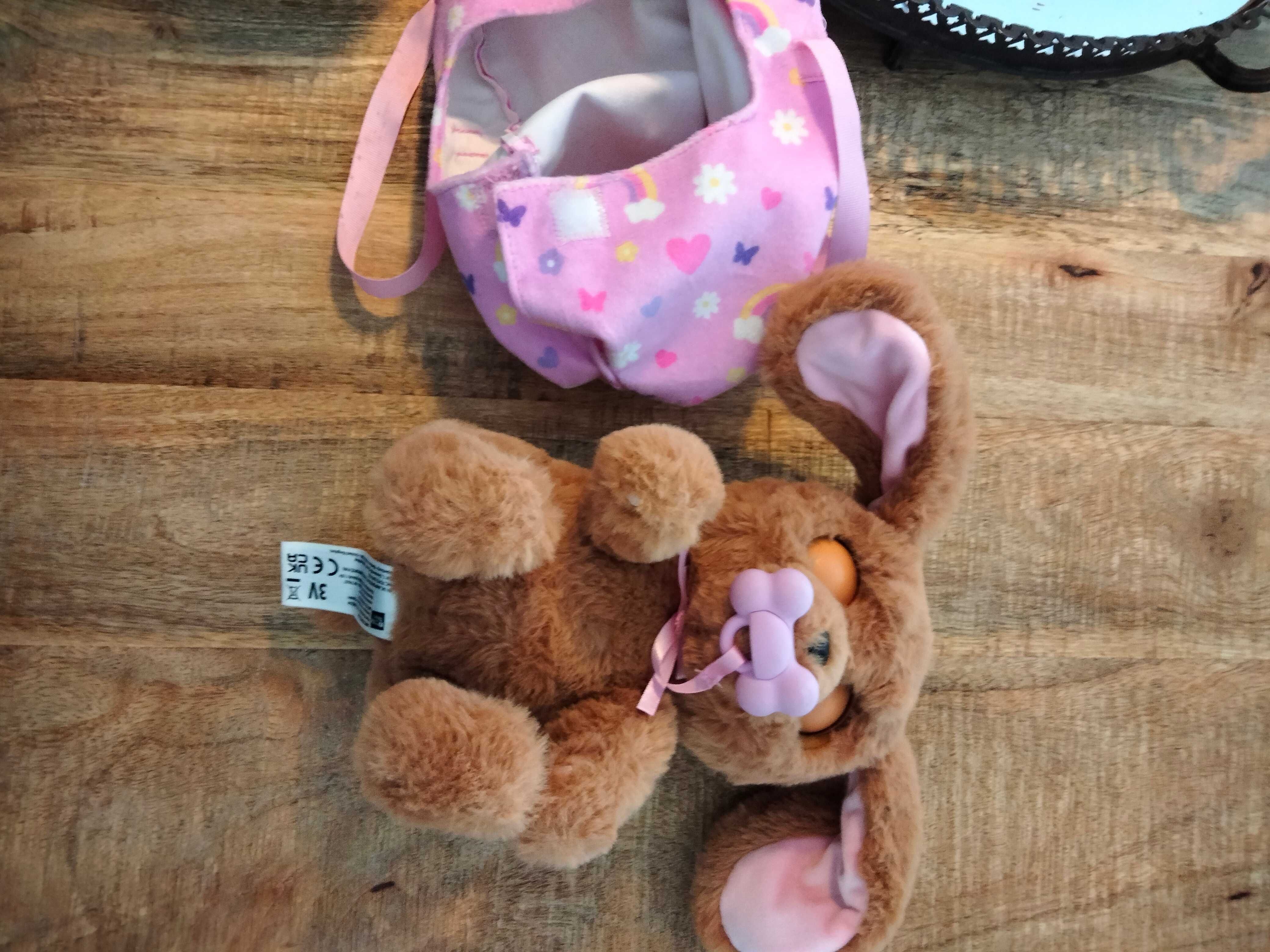 Peluche a pilhas com chucha