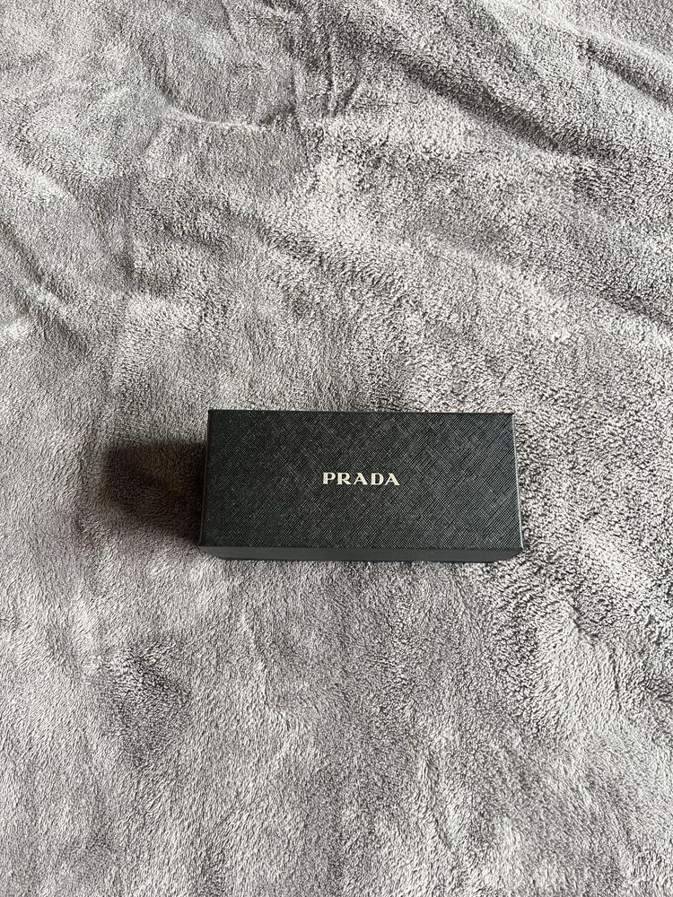 Óculos pretos Prada