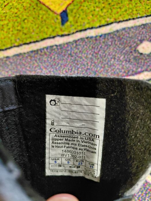 Пуховий комбінезон та чоботи Columbia