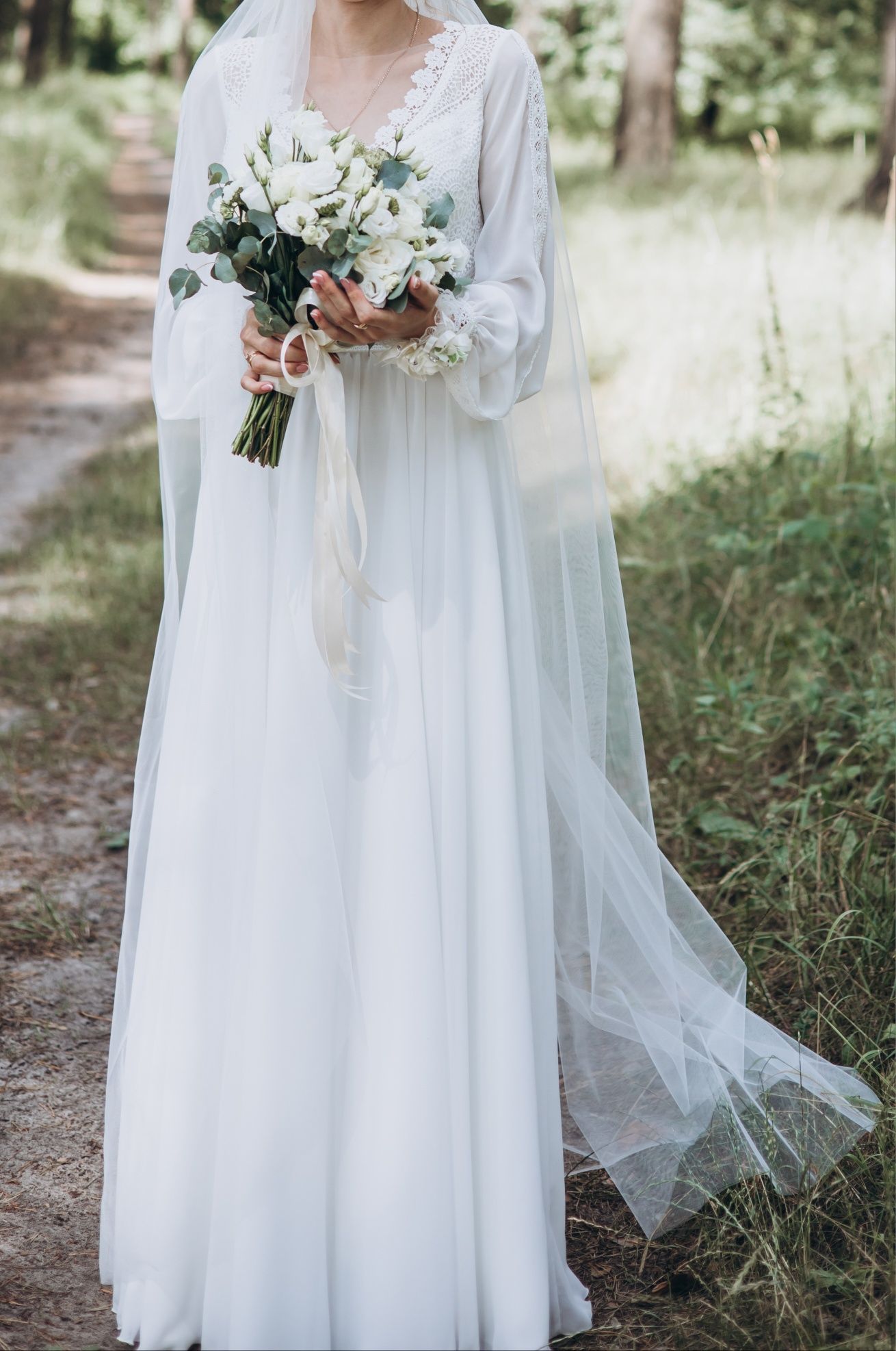 Весільна сукня вишукана