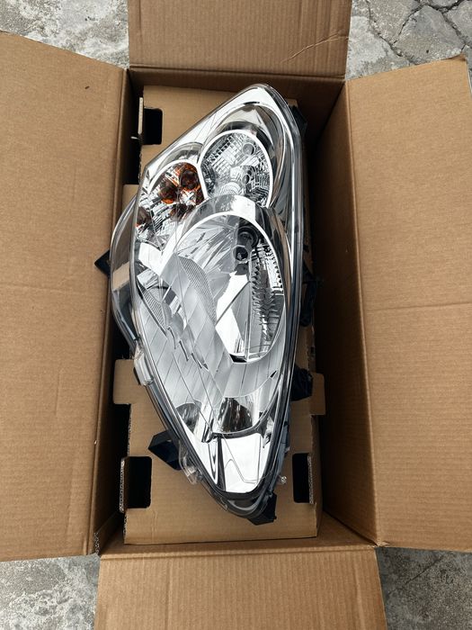 Farol de origem  novo citroen berlingo ou peugeot partner