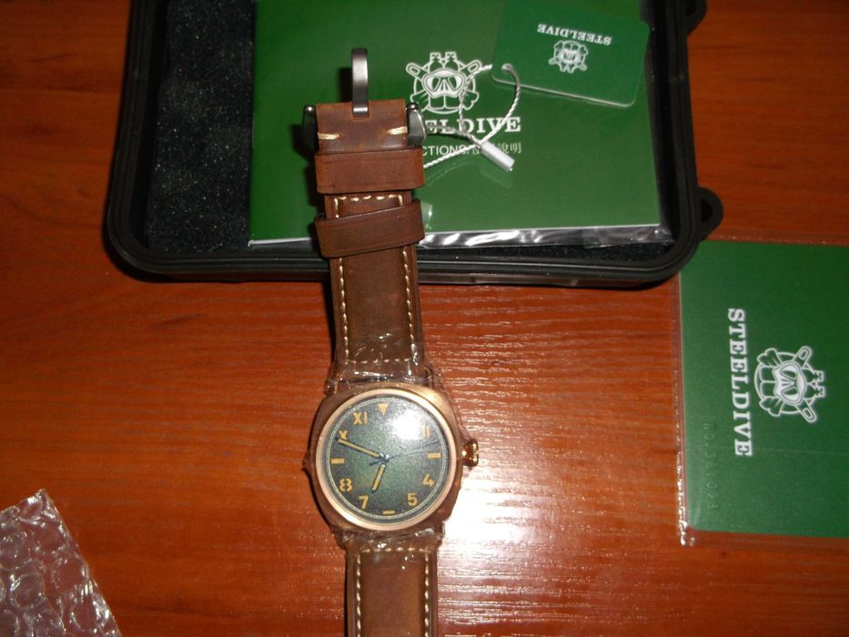 Продам новые бронзовые часы STEELFLIER  SF760S
