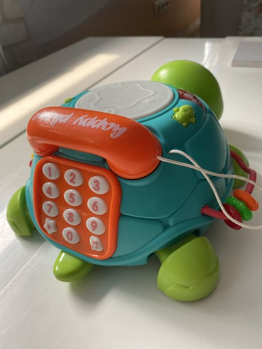 Розвіваюча, музична черепашка телефон. Має багато функцій.
