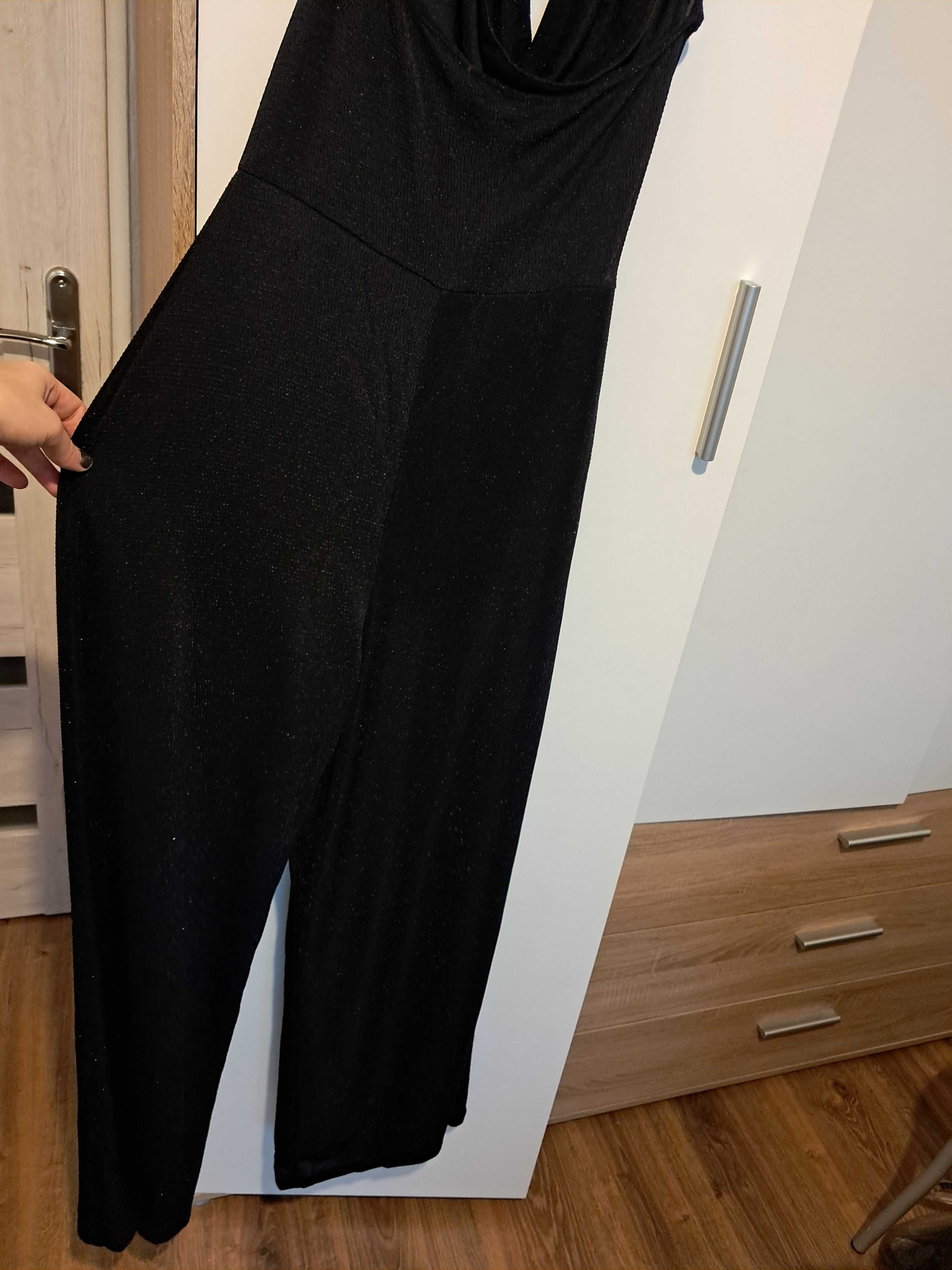 Kombinezon damski czarny z błyszczącą nitką Gina Tricot rozm. M/L