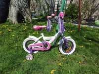 Rowerek dla dziewczynki z bocznymi kołami