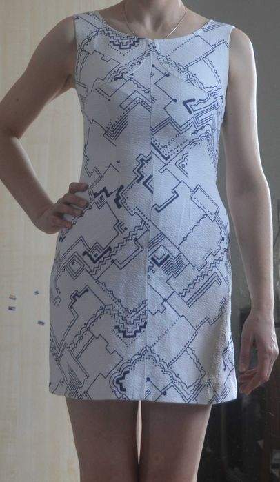 Biała krótka sukienka rozm.34