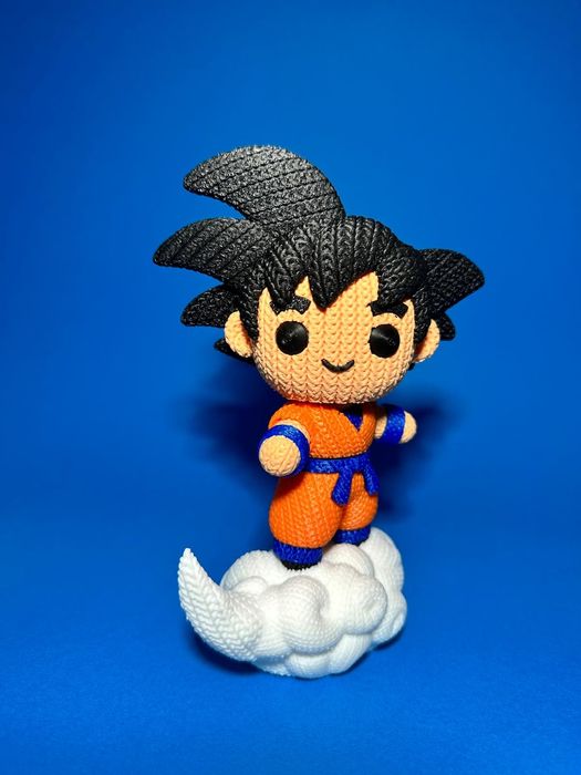 Goku surfando em nuvem - efeito crochê