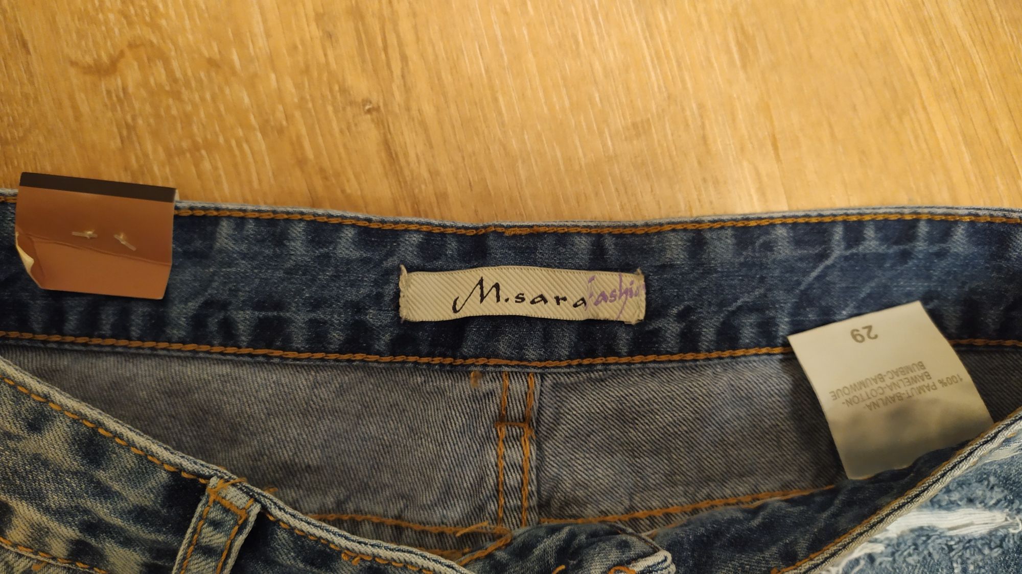 Новые крутые джинсовые шорты с бусинками