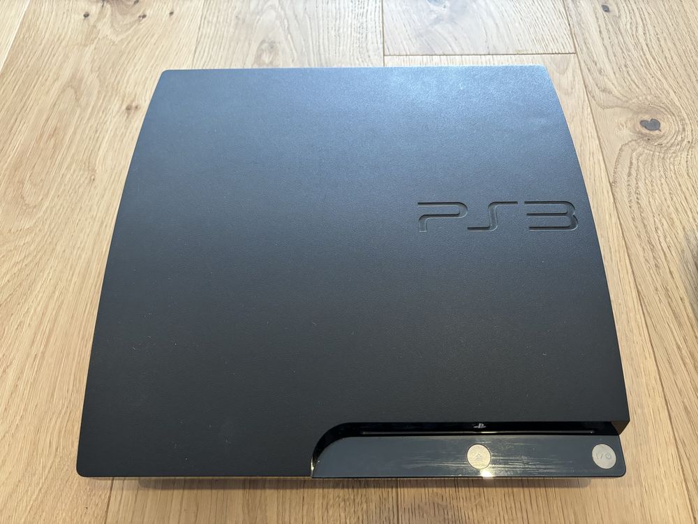 Playstation 3 Slim Consola e 2 Comandos