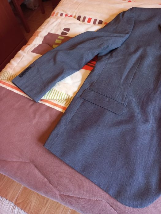 Casaco cinza  da parte do blazer