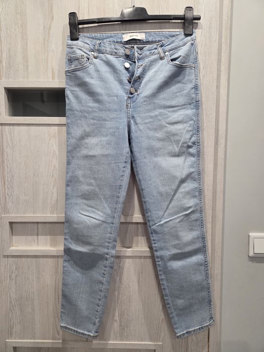 Jeansy damskie Reserved