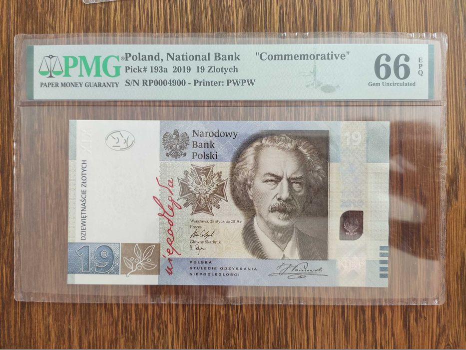 Banknot kolekcjonerski 19 zl. 100 lat PWPW Grading PMG66