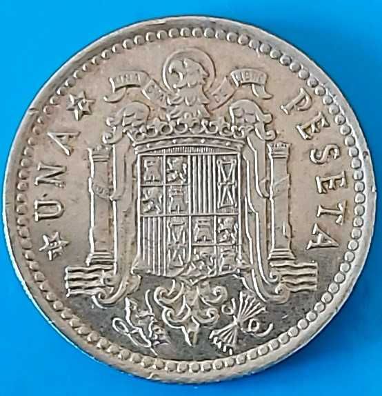 Una Peseta de 1966 com *72* na estrela, Espanha