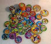 Lote dezenas de tazos yu gi oh variadas coleções