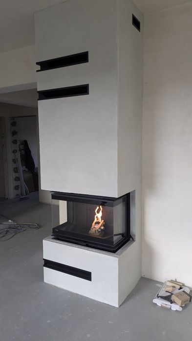 Nowoczesny kominek do rekuperacji z zabudową.