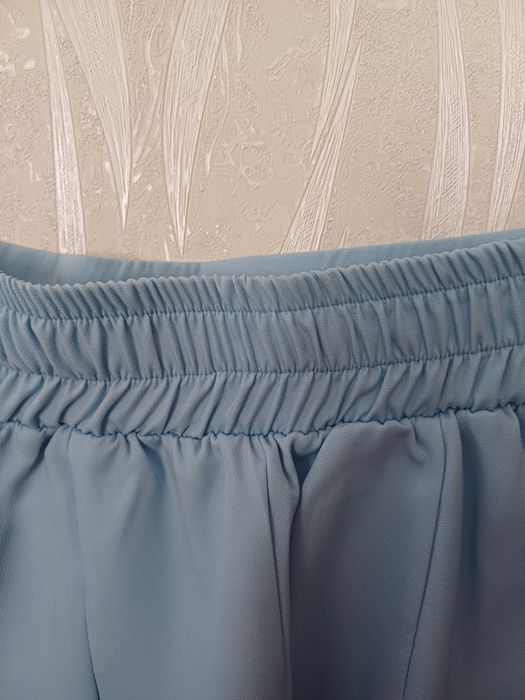 Новий жіночий брючний костюм