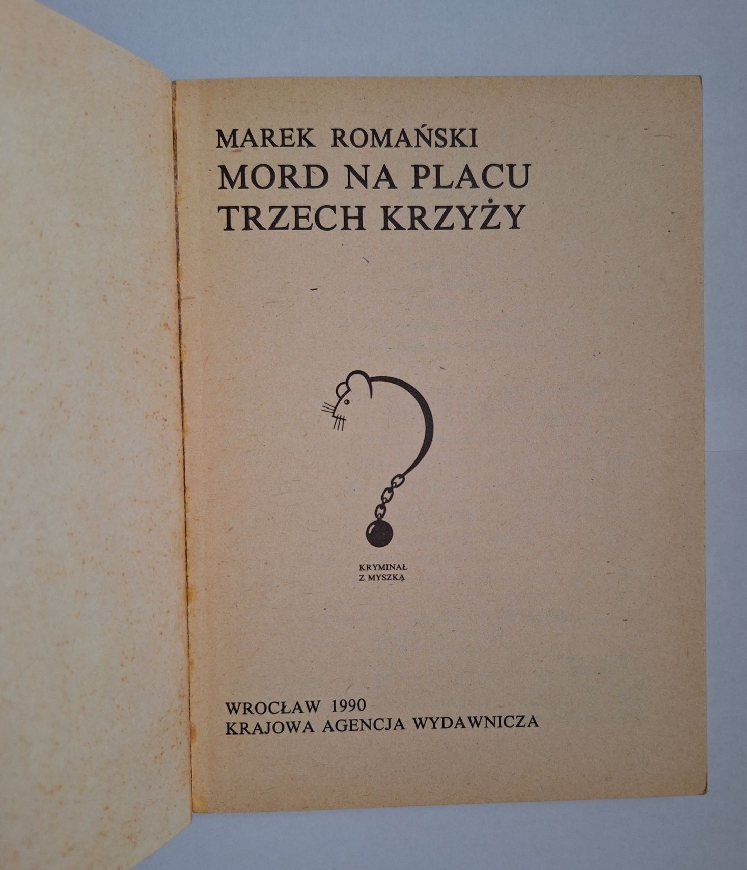 Mord na Placu Trzech Krzyży, Marek Romański  - kryminał