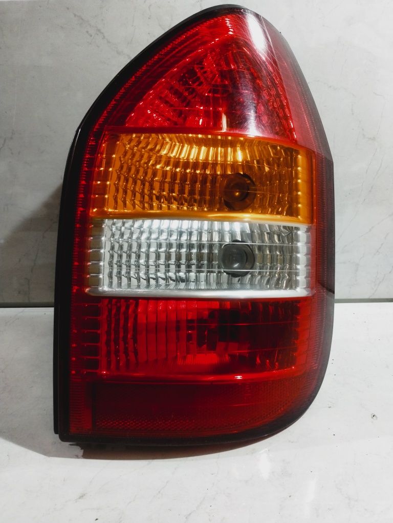 Stan BDB Lampa prawa prawy tył Opel Zafira A