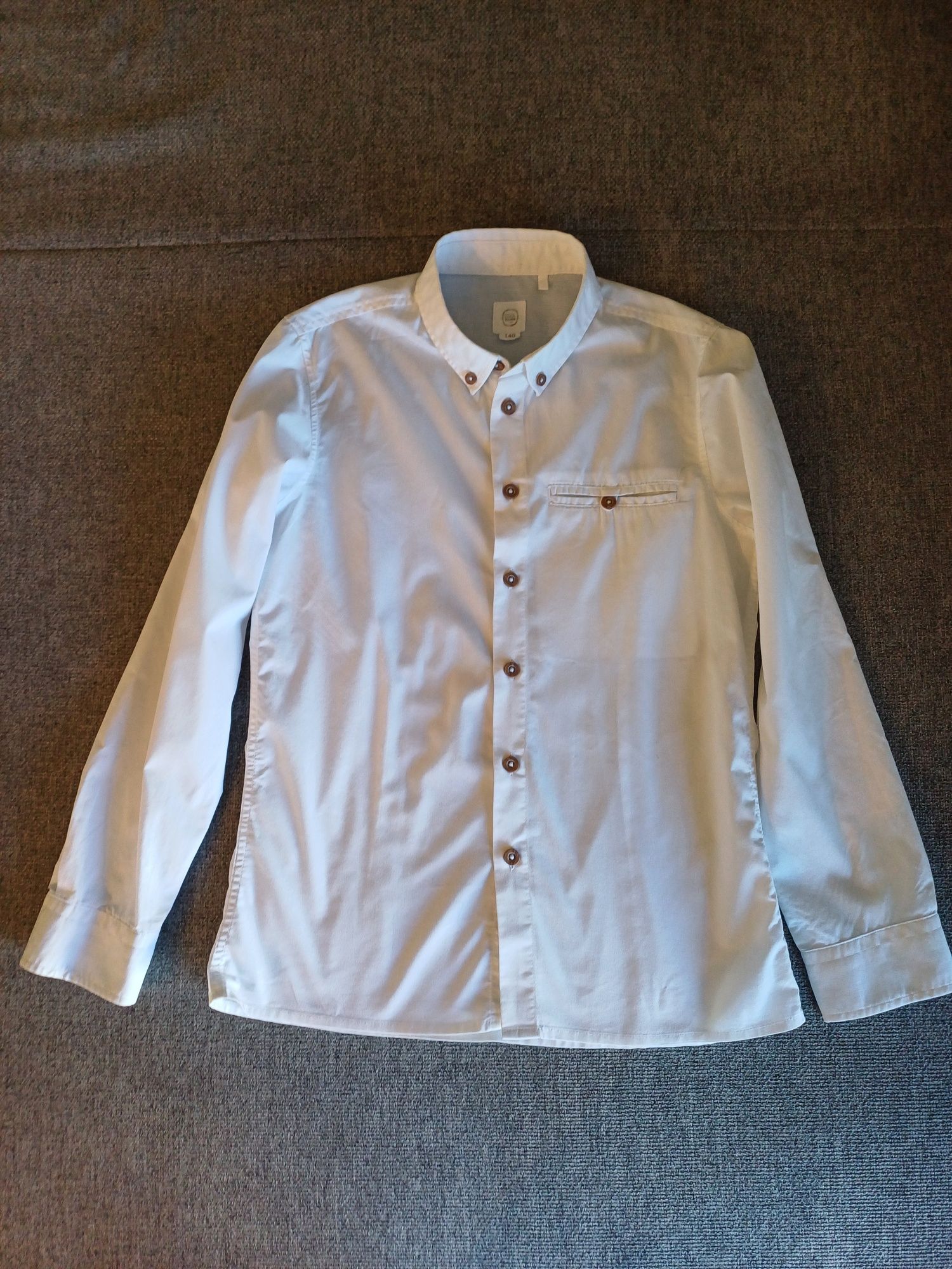 Koszula chłopięca białą Smyk rozmiar 140