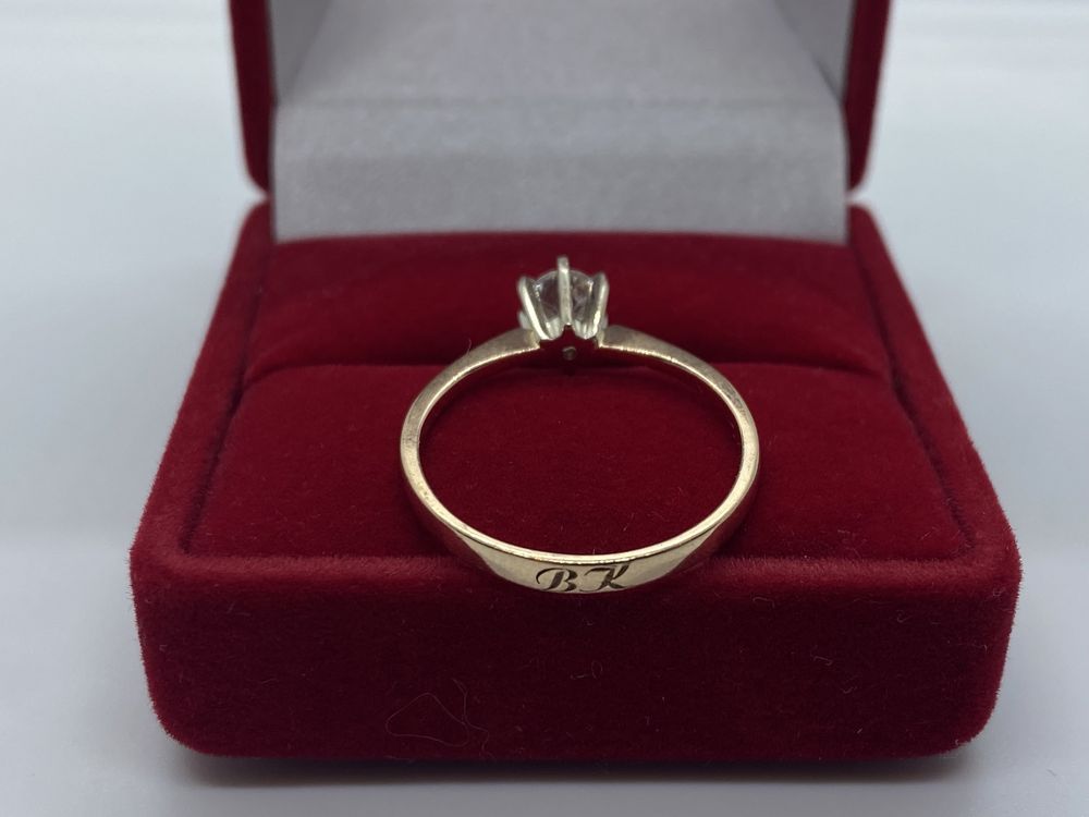 Złoty pierścionek z brylantem zaręczynowy ceryfikat
