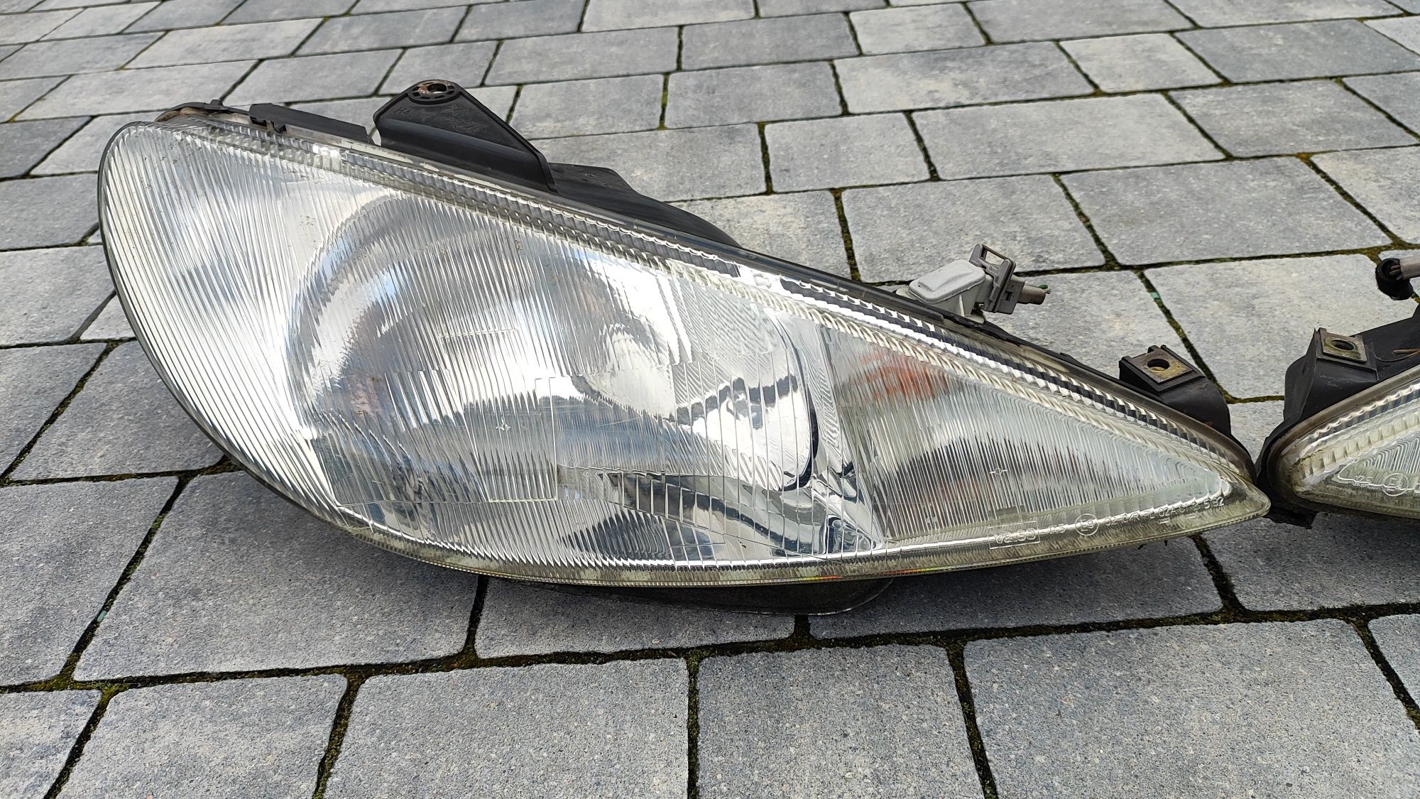 Lampy przednie przód Peugeot 206 Valeo Europa