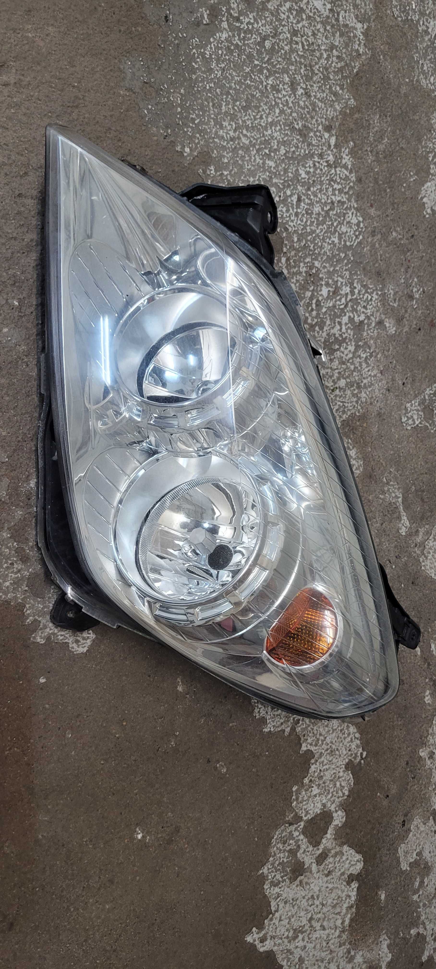 Lampa lewy przód Astra H III lift