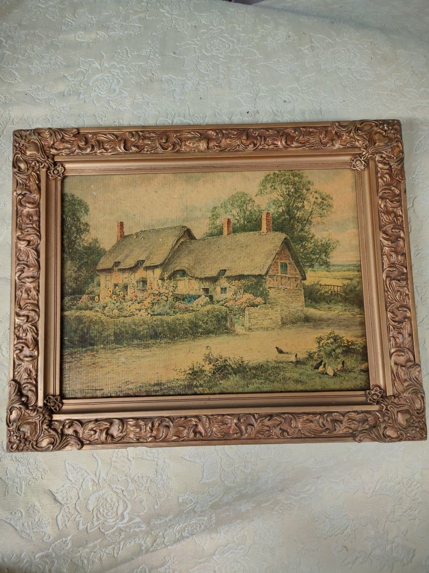 Quadro antigo com moldura em madeira.