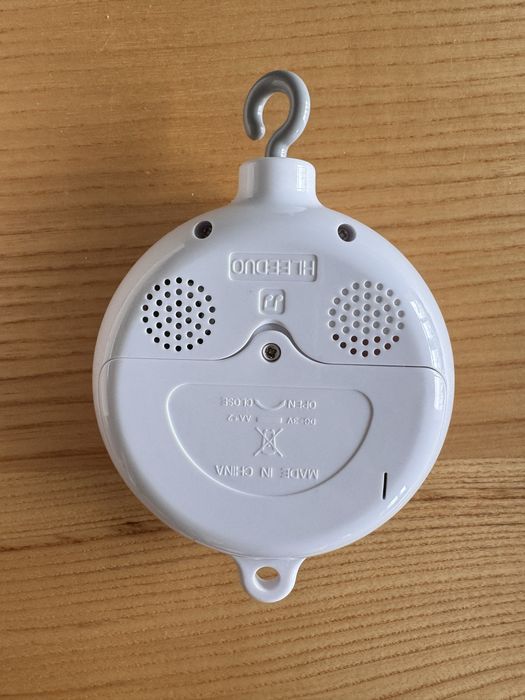 Тримач для мобіля, мобіль та музикальний блок