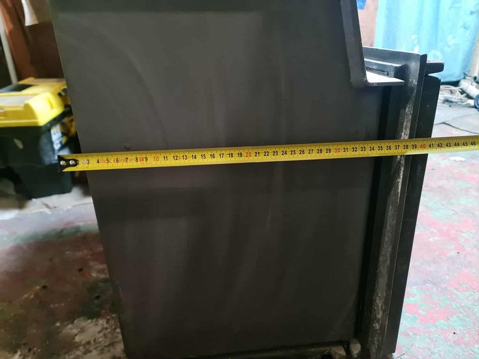 Kominek żeliwny wolnostojący