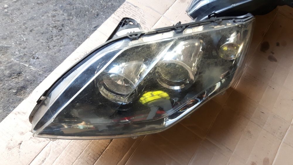 Lampa lewa przednia Renault Laguna III GT czarna lewy przód EUROPA