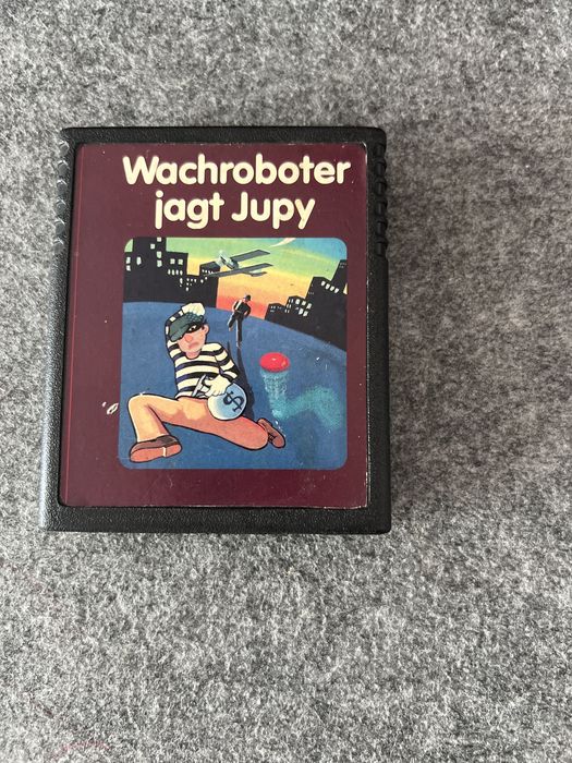 #1521 Wachroboter jagt jupy gra atari 2600 cartridge dyskietka