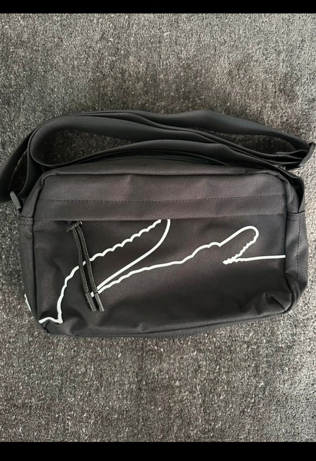 Bolsa Lacoste nova
