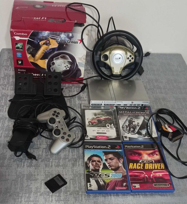 PlayStation 2 MODEL NO SCPH-75004 plus  dodatki