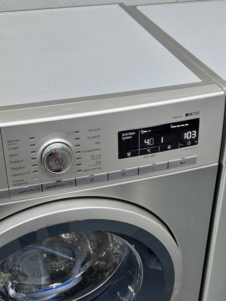 Комплект пральна + сушильна машина Siemens WT45W569DN та WM14W5S9DN