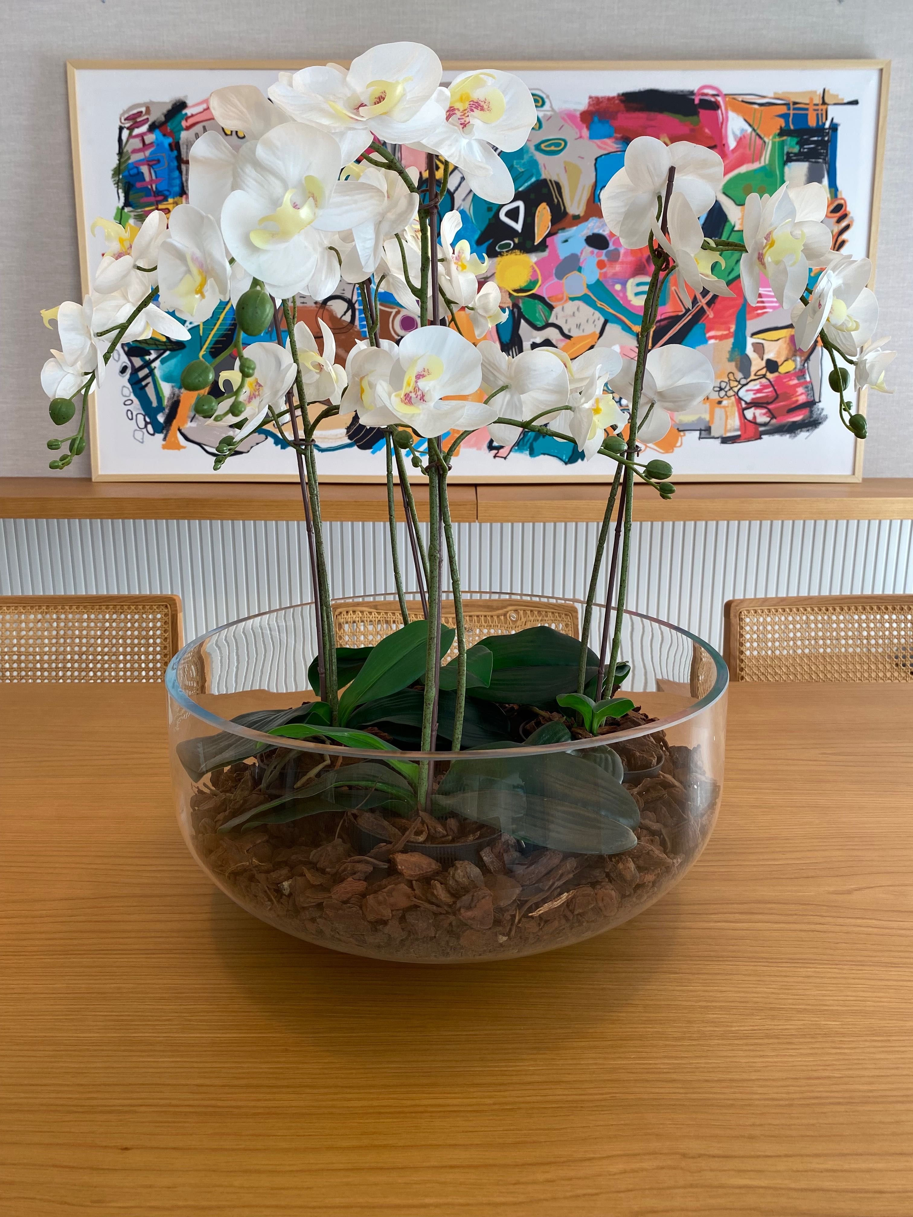 Centro de mesa com orquídeas artificiais