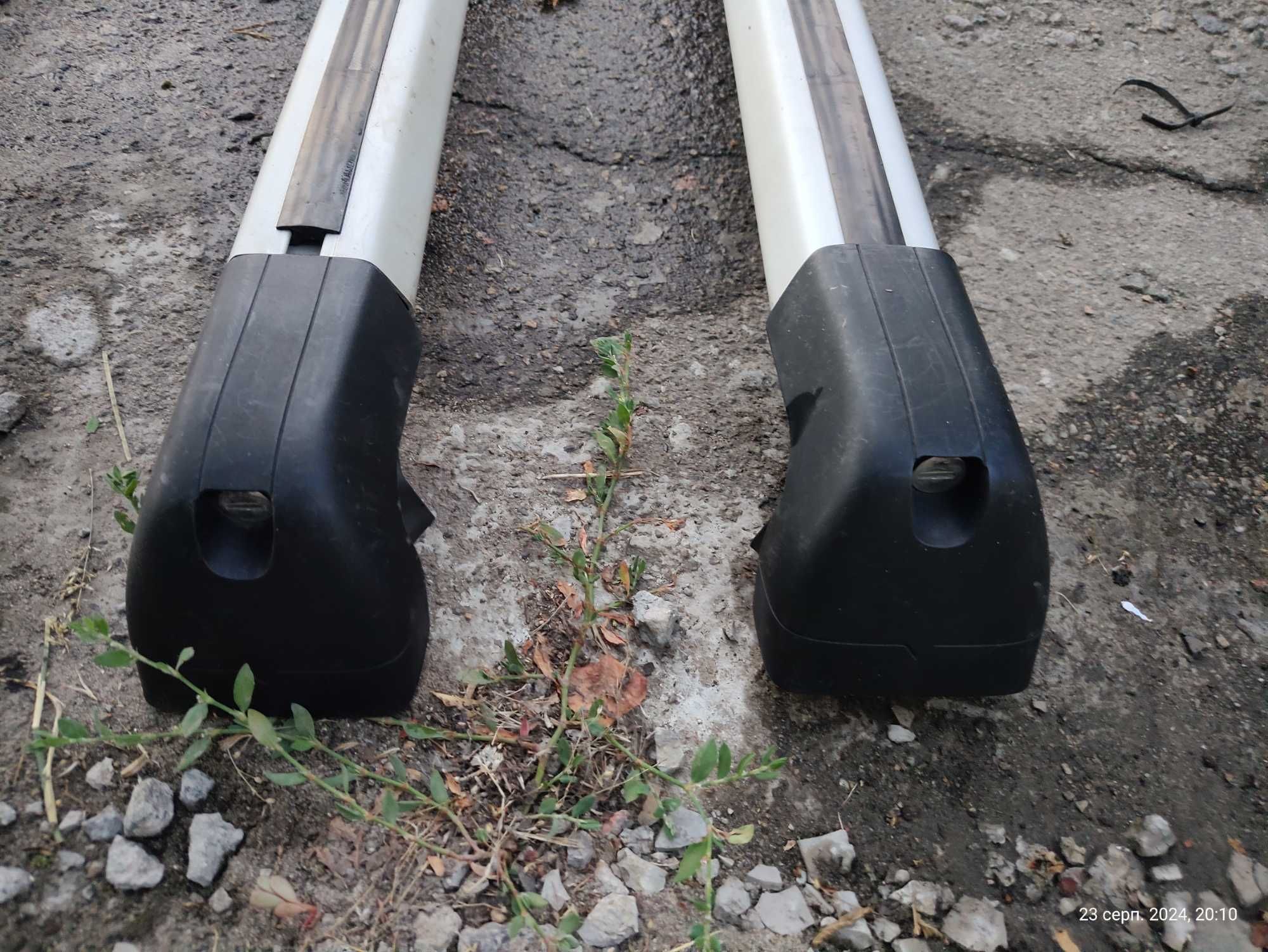 Renault megane 2 7711213699 original поперечини на рейлінги