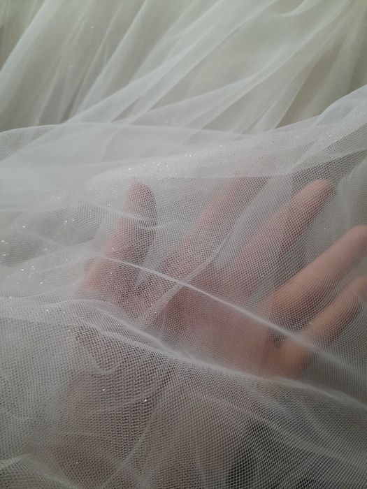 Lekka suknia ślubna w typie księżniczki. Serdecznie polecam