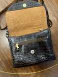 Bolsa a tiracolo em pele