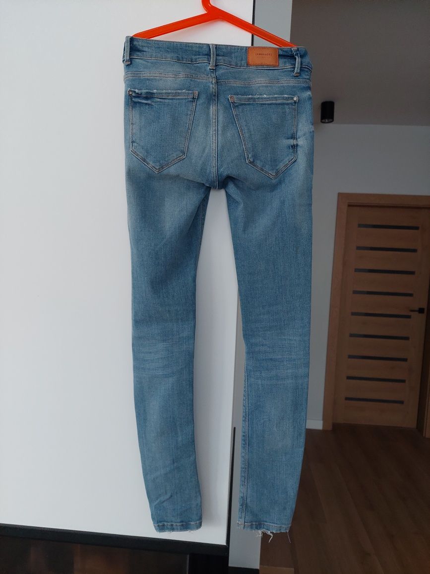 Zara jeansy rurki z dziurami 34 j.nowe