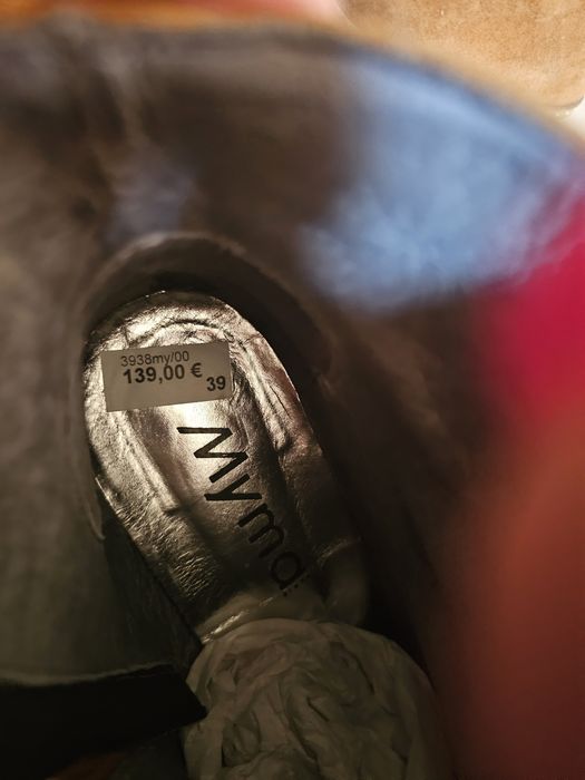 Sandália e bota usados uma vez