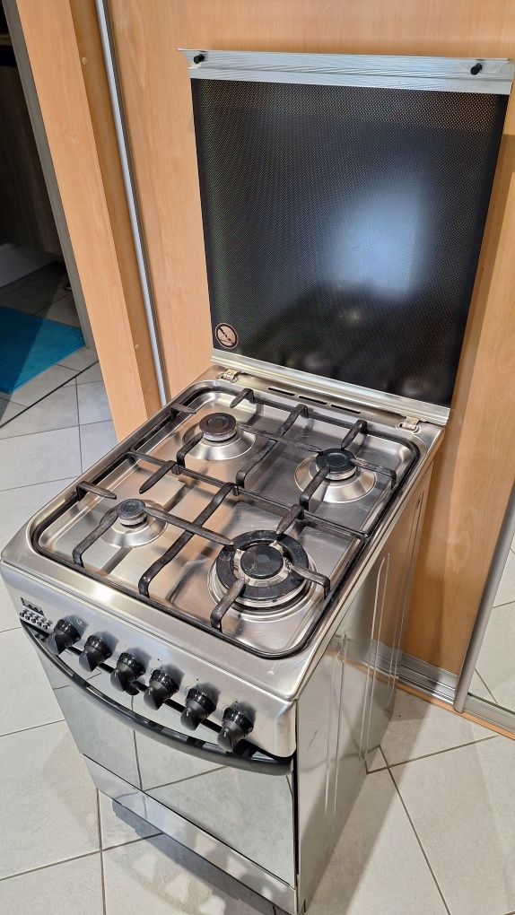 Kuchnia gazowo-elektryczna Hotpoint-Ariston C 35S P6 (X) stan wzorowy
