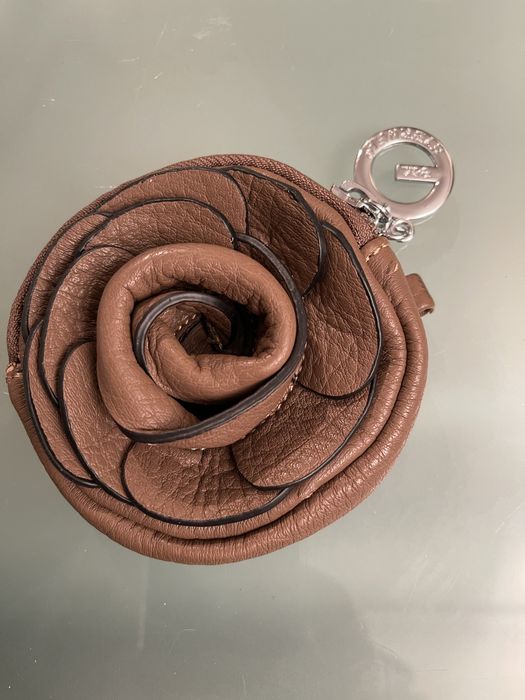 Porta moedas,crianca e senhora