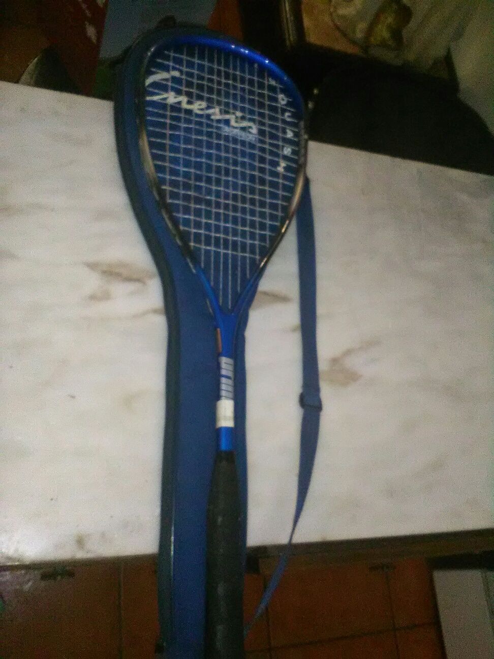 Raquete de Squash