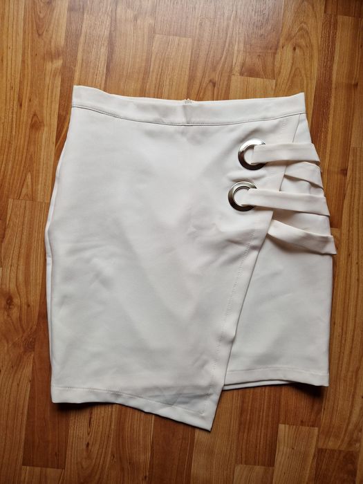 Elegancka beżowa spódnica z zakładką i ozdobnym splotem La Perla