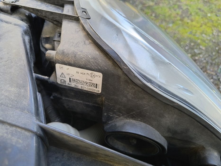 Ford Mondeo MK4 lift 10-14 - Reflektor lewy kpl. Oryginał EUR.